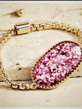 Gold Bracelet with Pink Glitter Oval Stone - Unknown Brand